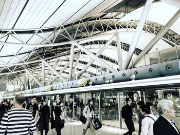 People at railroad station platform