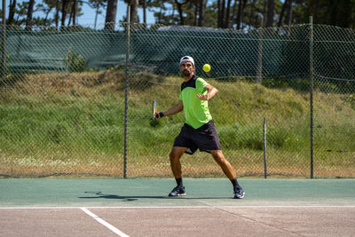 Man playing tennis