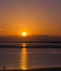 View of calm sea at sunset