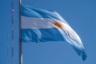 Argentina flag on a blue background