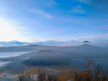 Panoramic view of volcanic mountain landscape against sky