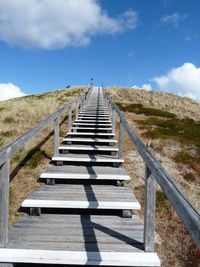 Low angle view of staircase against sky