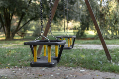 Empty bench in park