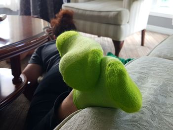 Close-up of woman wearing green socks