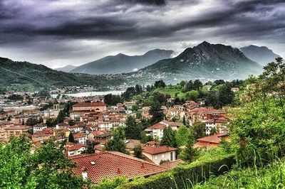 High angle view of town against cloudy sky