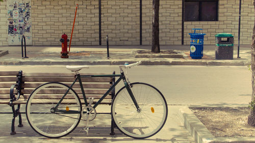 Boy bicycle in front of building