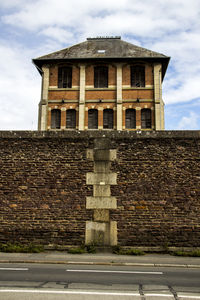 Low angle view of old building against sky