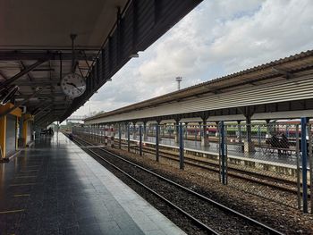 Railroad station platform against sky