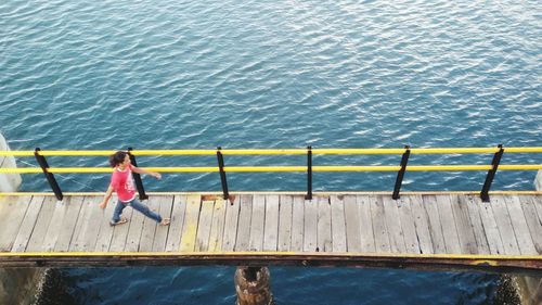 High angle view of pier over calm sea