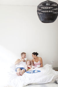 Family breakfast in bed, vaxjo, smaland, sweden