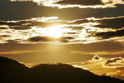 Scenic view of mountains at sunset