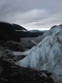 Scenic view of mountains against sky during winter