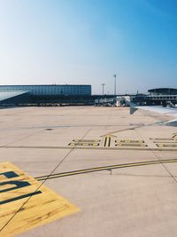 At the airport, ready for take off, traveling on a sunny day with blue sky 