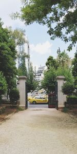 Street by building against sky