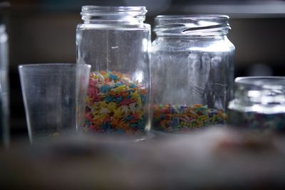 Close-up of glass jar on table