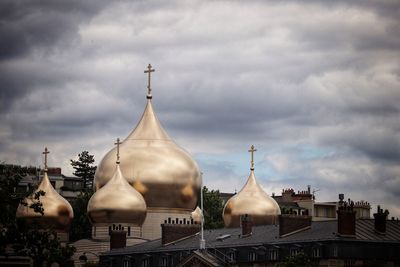 Mosque against sky in city