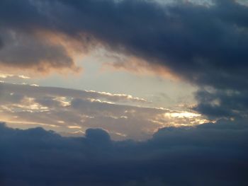 Low angle view of clouds in sky during sunset