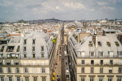 High angle view of street amidst buildings in city