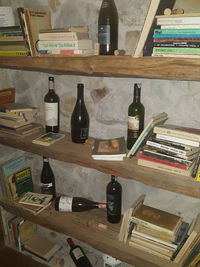 Close-up of wine bottles on table