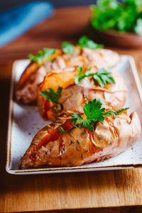 Close-up of food served on table