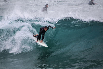 Man surfing in sea