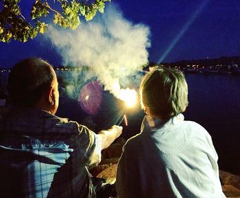 Firework display at night