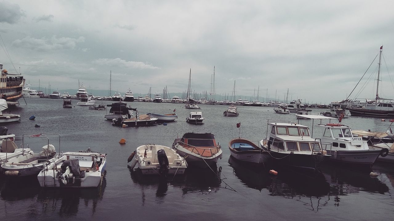 nautical vessel, transportation, moored, mode of transport, sky, cloud - sky, water, boat, outdoors, day, no people, sea, reflection, nature, harbor, sailboat, mast, horizon over water