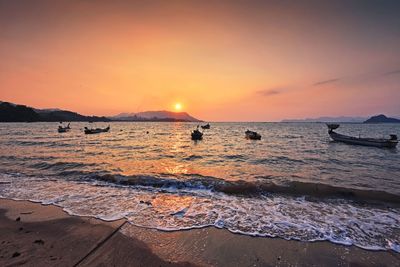 Scenic view of sea against sky during sunset