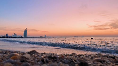 Scenic view of sea against sky during sunset