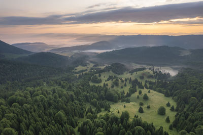 Scenic view of mountains against sky during sunset