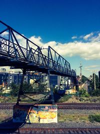 View of bridge against cloudy sky