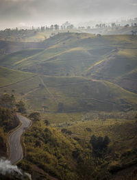 High angle view of road amidst landscape against sky