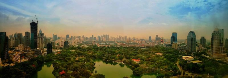 Panoramic view of city buildings against sky