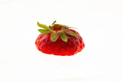 Close-up of strawberry against white background