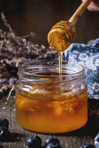 Close-up of honey in jar on table