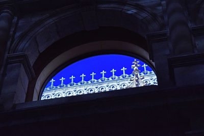 Low angle view of built structure against blue sky