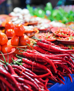 Red chili peppers for sale at market stall