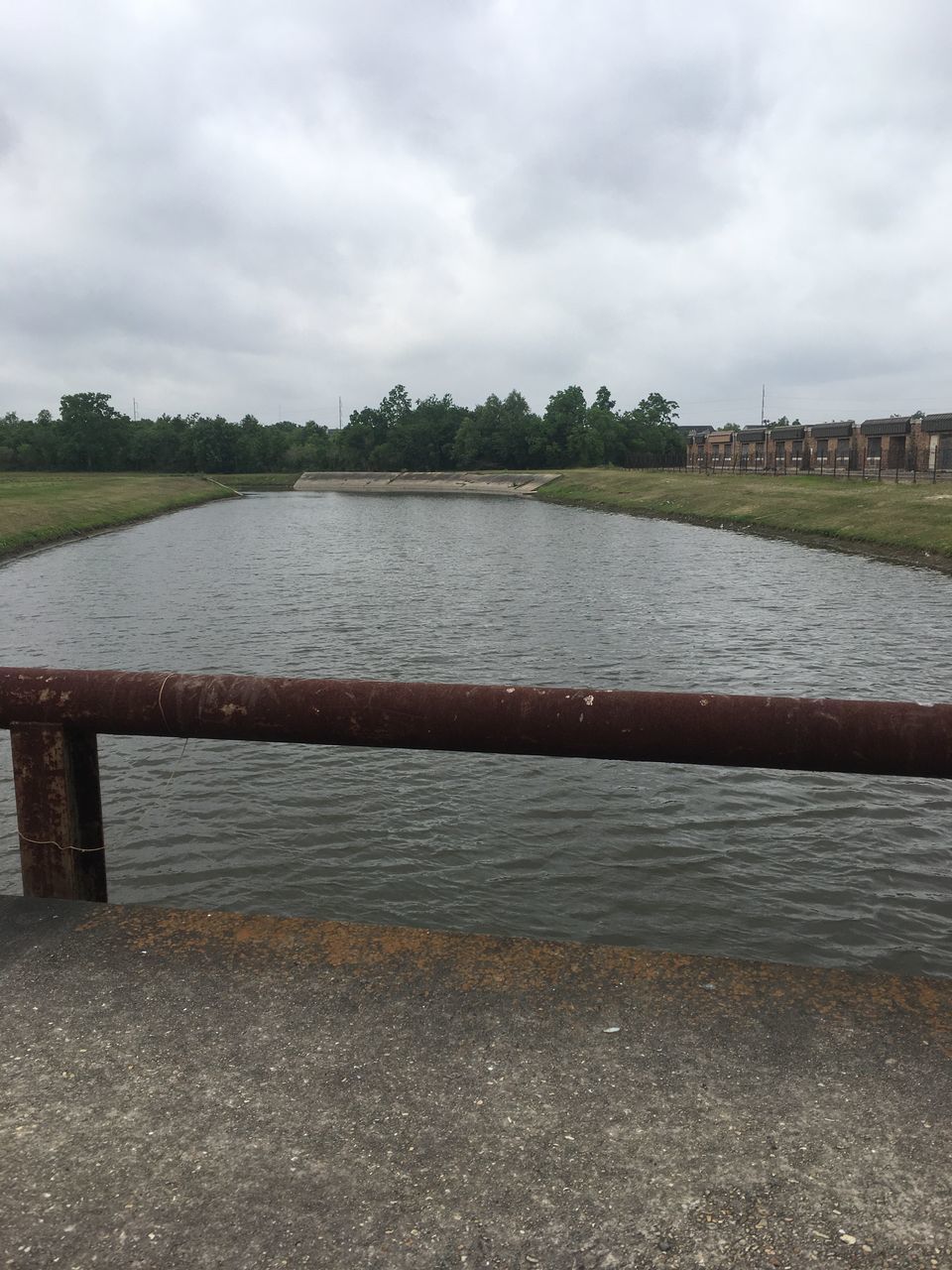 water, river, sky, cloud - sky, day, tranquility, outdoors, nature, built structure, riverbank, no people, architecture, tree, tranquil scene, scenics, beauty in nature