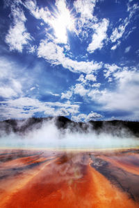 View of hot spring against sky