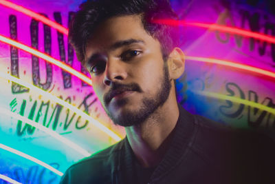 Portrait of young man looking away