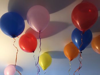 Low angle view of balloons hanging on ceiling