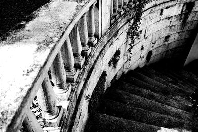 High angle view of old staircase against wall