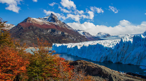 Scenic view of glacier and mountains during winter