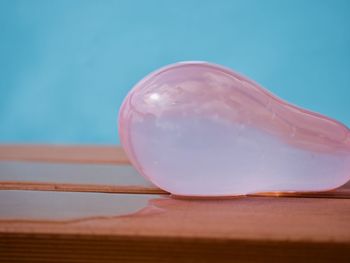 Close-up of blue ball on table