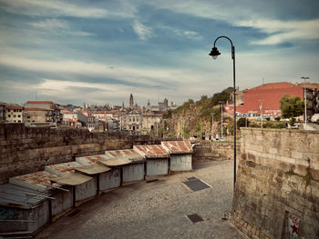 High angle view of street and buildings against sky