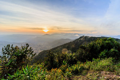 Scenic view of mountains against sky during sunset