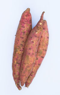 Close-up of meat against white background