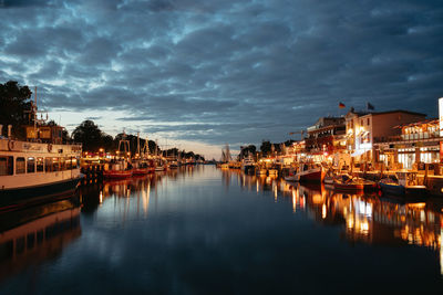 Illuminated buildings in water warnemünde alter strom