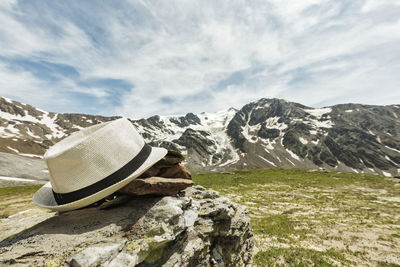 Rocks on mountain against sky