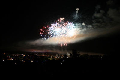 Firework display at night